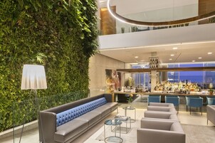 2 bars/lounges, 2 beach bars, poolside bar