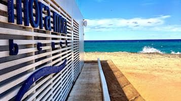 On the beach, white sand, free beach shuttle, beach cabanas