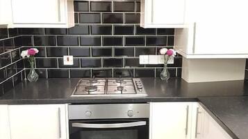 Apartment | Private kitchen | Full-size fridge, microwave, oven, coffee/tea maker