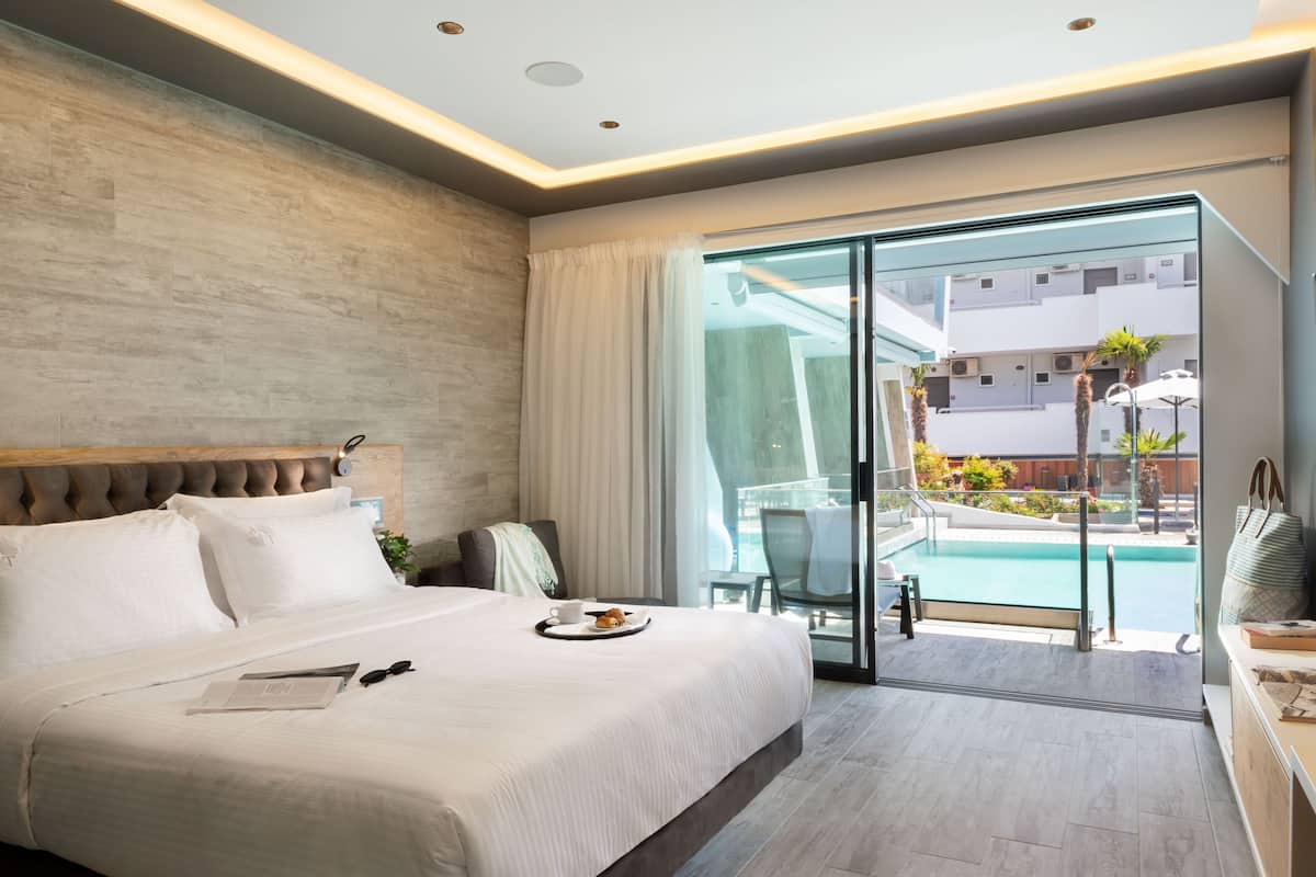 2 habitaciones, ropa de cama de alta calidad y minibar