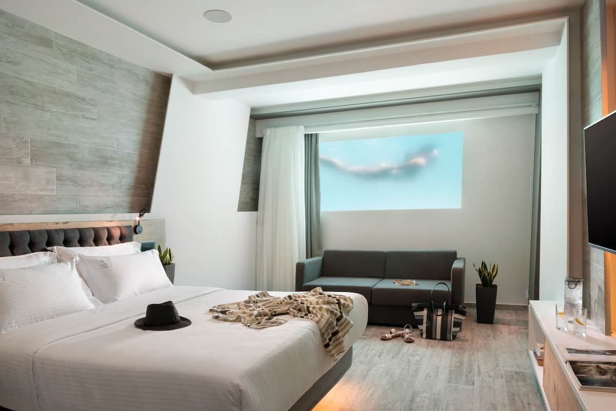 2 habitaciones, ropa de cama de alta calidad y minibar