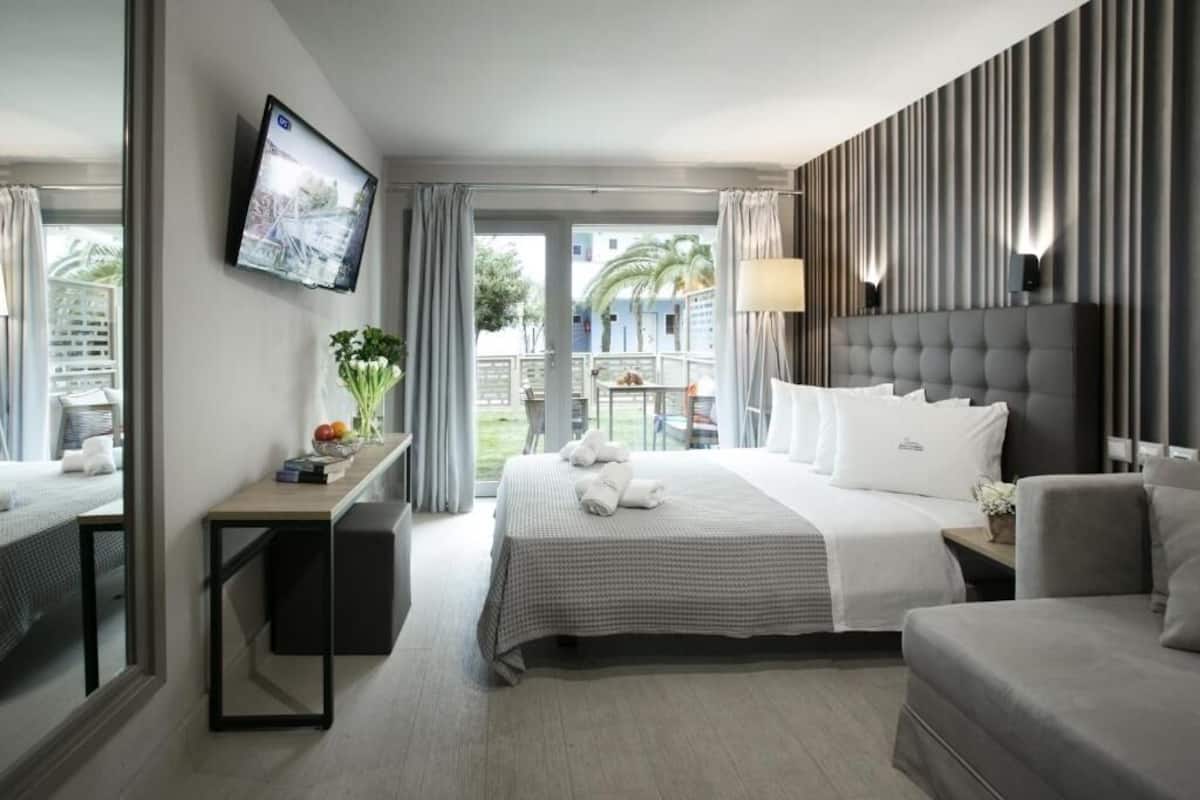 2 habitaciones, ropa de cama de alta calidad y minibar