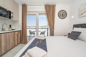 Studio Deluxe, balcon | Coin séjour