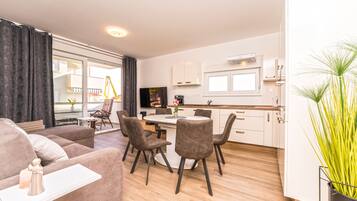 Comfort Apartment, 2 Bedrooms, Terrace | Living area | 45-inch flat-screen TV with cable channels, TV