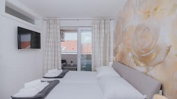 Apartamento, 3 quartos, terraço | 1 quarto, Wi-Fi de cortesia, roupa de cama