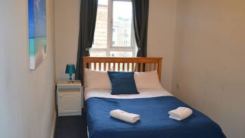 City Apartment, Multiple Beds | Iron/ironing board, bed sheets