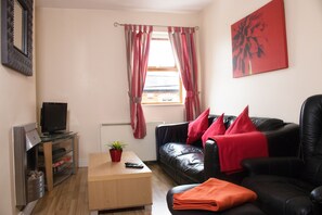 En 42-tommers LCD-TV med digitale kanaler samt TV og Netflix