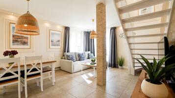 Deluxe Apartment, Multiple Beds, Partial Sea View | In-room safe, soundproofing, iron/ironing board, free WiFi