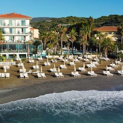 Private beach, black sand, sun-loungers, beach umbrellas