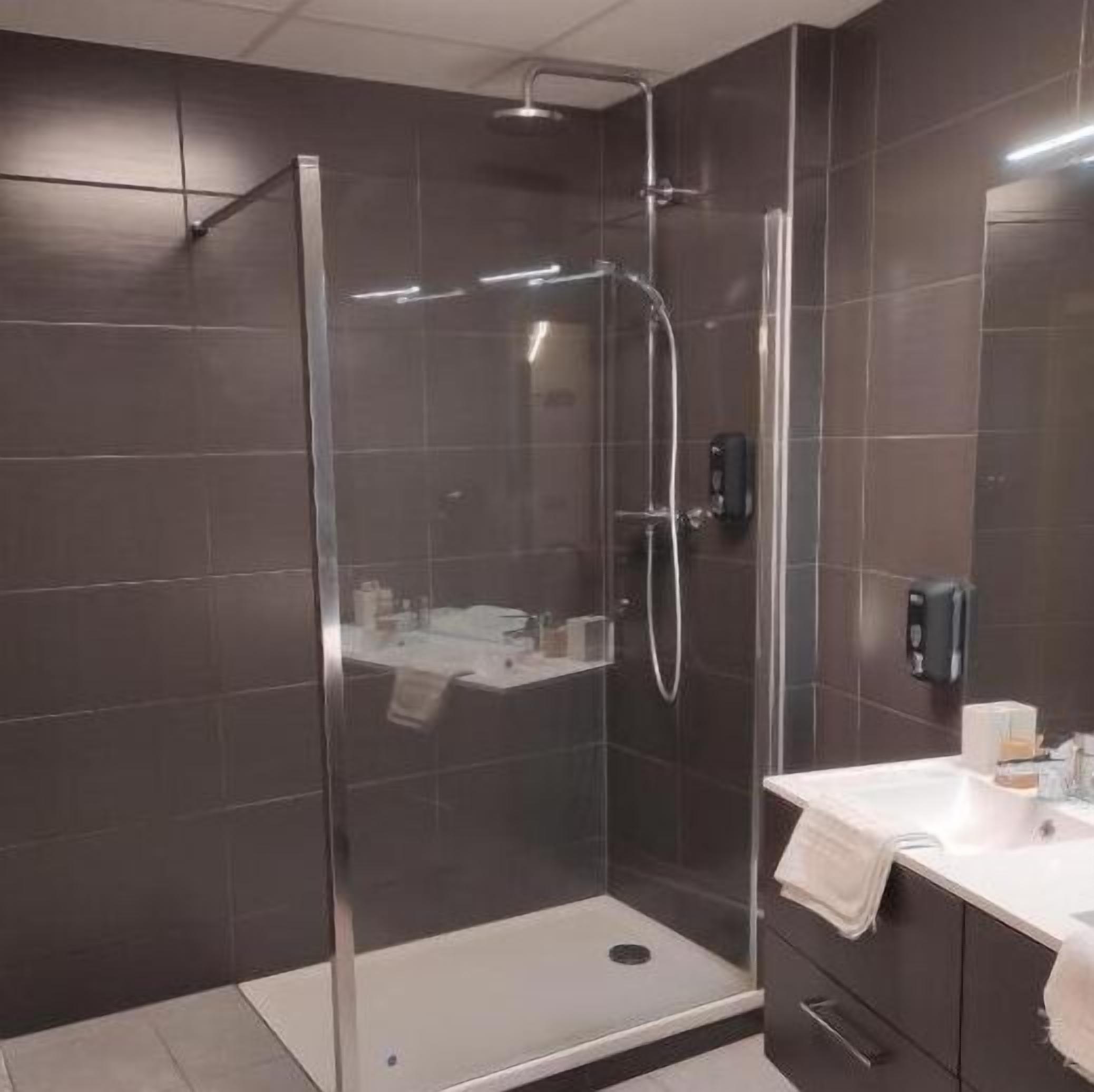 comfort quadruple room | bathroom | free toiletries, hair dryer, towels, soap