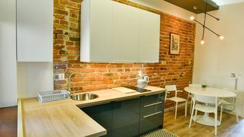 Family Apartment, 1 Bedroom (18) | Living area | 45-inch flat-screen TV with cable channels, TV