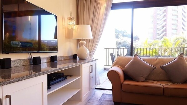 Executive Apartment, 3 Bedrooms | Living room | Flat-screen TV, DVD player
