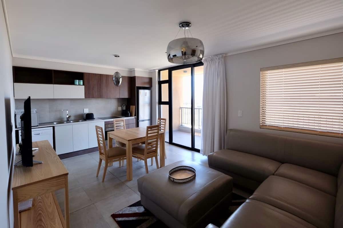 Appartement Standard, 1 chambre | Aire de séjour | Téléviseur connecté de 50 po avec télévision par satellite, téléviseur