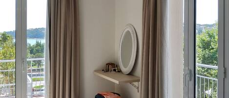 Premium Apartment, Sea View | In-room safe, blackout drapes, soundproofing, iron/ironing board