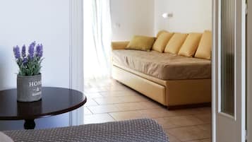Classic Apartment, Partial Sea View | Living area | LCD TV