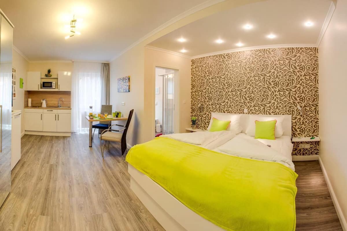 hypo-allergenic bedding, desk, blackout curtains, soundproofing