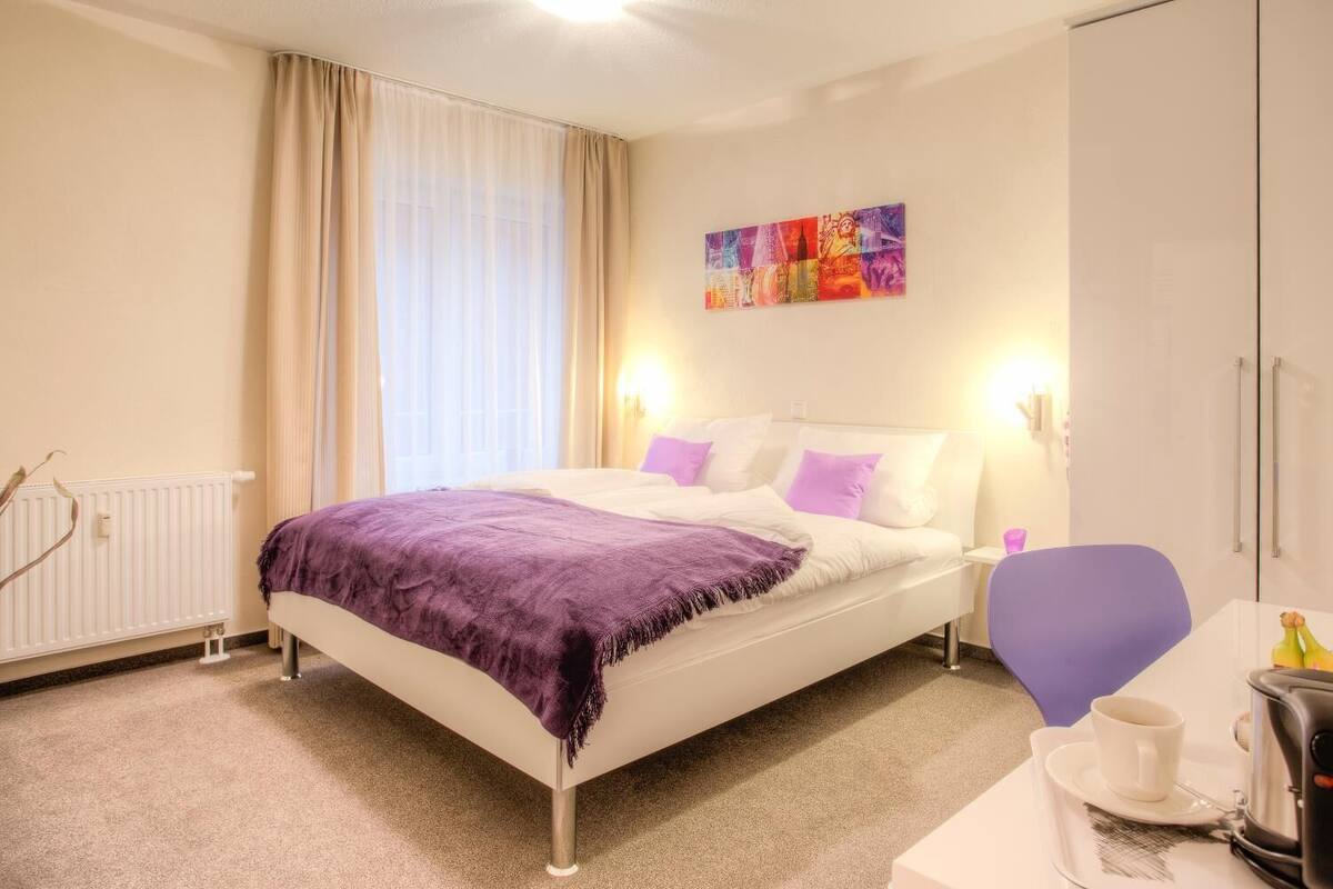 hypo-allergenic bedding, desk, blackout curtains, soundproofing