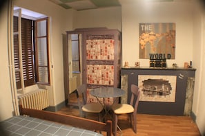 Family Room, 2 Double Beds | Individually decorated, individually furnished, iron/ironing board