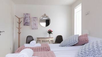 Apartamento, 2 habitaciones | Cortinas opacas, cunas gratuitas, wifi gratis y ropa de cama