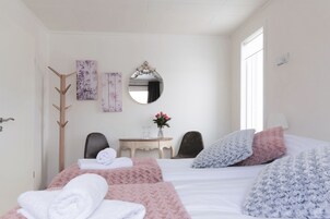 Apartment, 2 Bedrooms | Blackout drapes, free cribs/infant beds, free WiFi, bed sheets