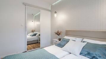 Apartament | 1 dormitori, planxa i posts de planxar, wifi gratuïta i roba de llit