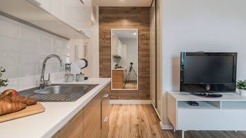 Apartament | 1 dormitori, planxa i posts de planxar, wifi gratuïta i roba de llit