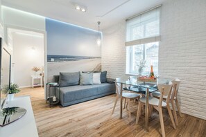Departamento | 1 habitación, tabla de planchar con plancha, wifi gratis y ropa de cama