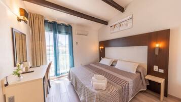 Exclusive Double Room, Non Smoking, Pool View | Minibar, in-room safe, individually decorated, individually furnished