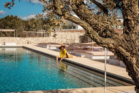 Outdoor pool, pool umbrellas, pool loungers