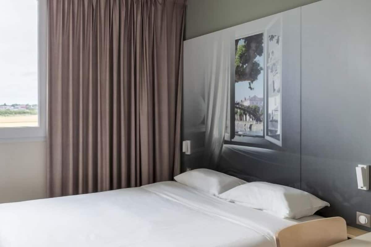 Bureau, chambres insonorisées, Wi-Fi gratuit, draps fournis