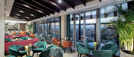 2 bars/lounges, rooftop bar, lobby lounge