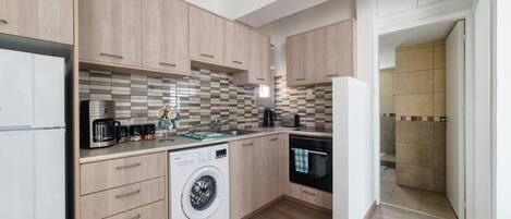 Apartment, 1 Bedroom, Sea View | Private kitchen | Full-sized fridge, microwave, oven, stovetop
