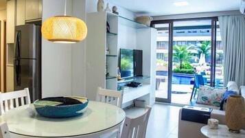 Family Apartment, Multiple Beds, Pool View | Living room