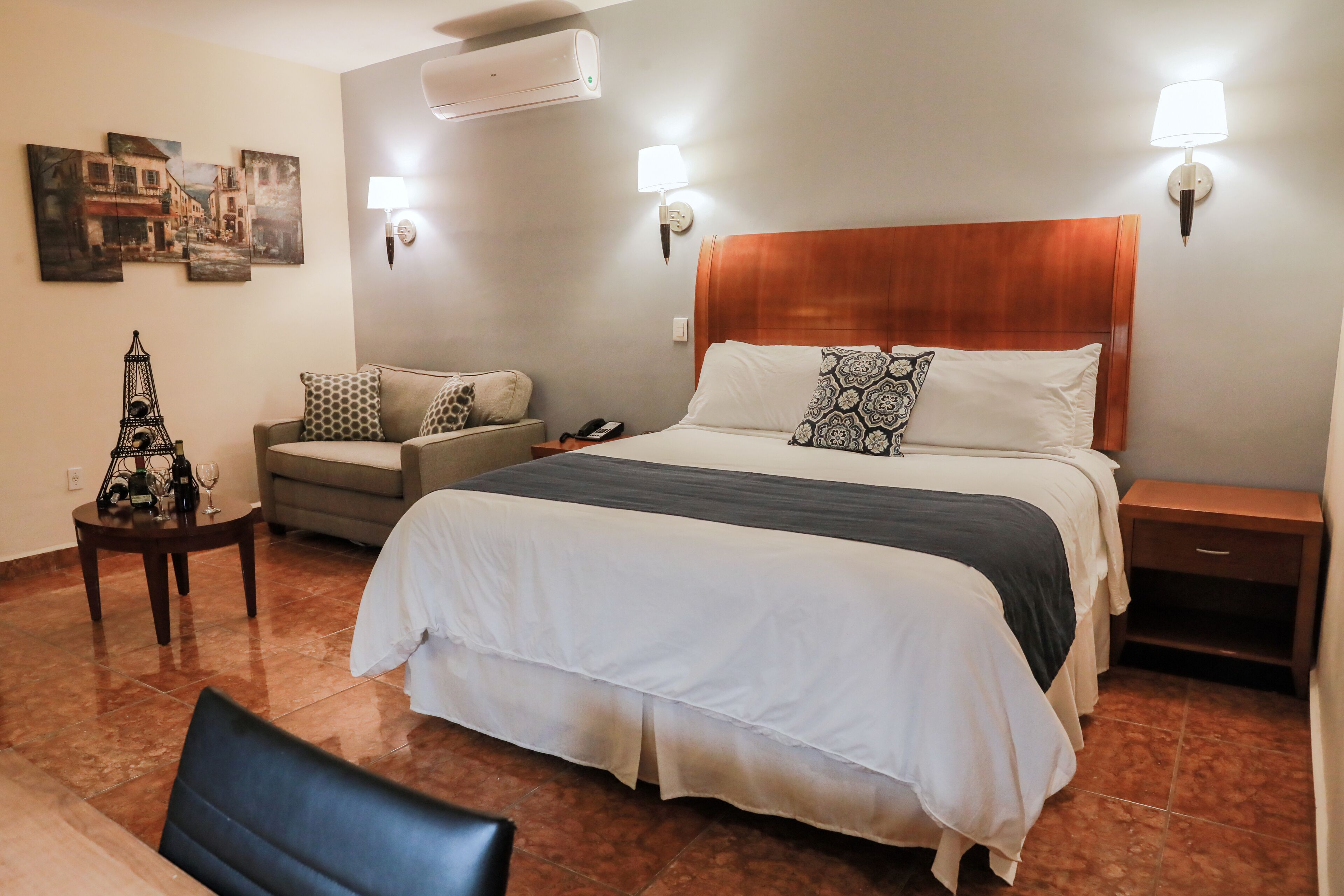 suite, 1 king bed, non smoking | in-room safe, desk, blackout curtains, iron/ironing board