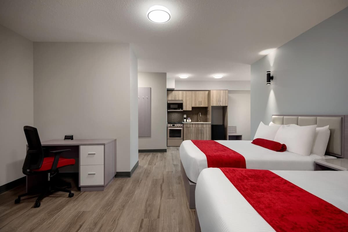 Suite, 2 Queen Beds, Non Smoking, Kitchenette | Free WiFi, bed sheets