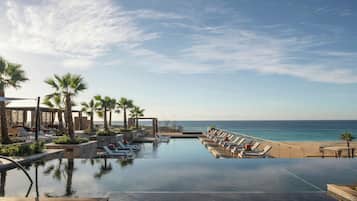 5 outdoor pools, open 7:00 AM to 7:00 PM, pool cabanas (surcharge)