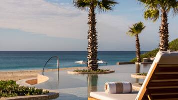 5 piscinas al aire libre, cabañas de piscina (de pago), sombrillas