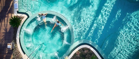 5 outdoor pools, open 7:00 AM to 7:00 PM, cabanas (surcharge)