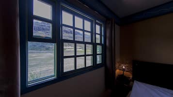 Apartamento Deluxe, vistas a la montaña | Minibar, cortinas opacas, wifi gratis y ropa de cama
