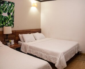 Down comforters, blackout drapes, free WiFi, bed sheets - Hotel Madreselva (Leticia)