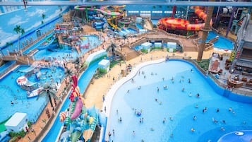 Indoor pool, open 6:00 AM to 10:00 PM, pool loungers