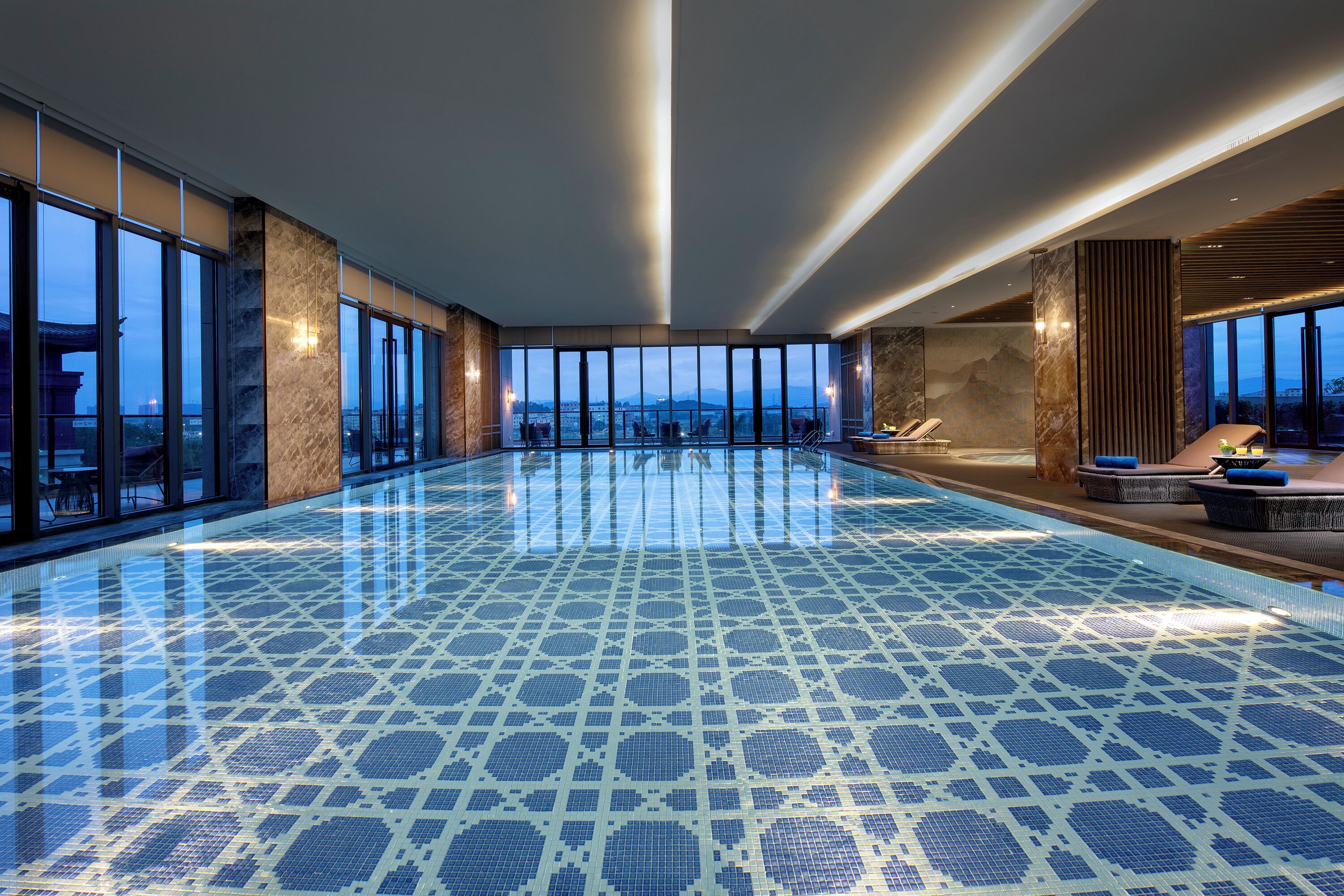 Indoor pool, open 6:00 AM to 10:00 PM, sun loungers