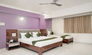Deluxe Room, Multiple Beds | Rollaway beds, free WiFi, bed sheets - Treebo Trend Kohinoor Residency (Pune)