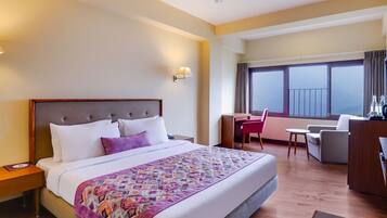 Deluxe Room, Balcony | Premium bedding, in-room safe, soundproofing, iron/ironing board