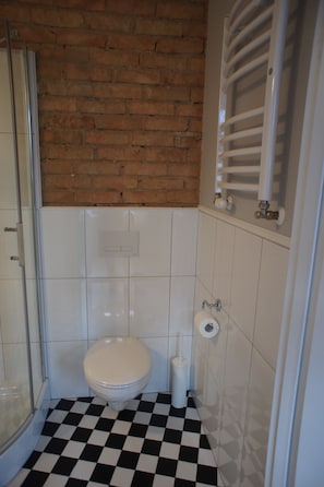 Apartment, 1 Queen Bed with Sofa bed (#51) | Bathroom | Shower, free toiletries, hair dryer, slippers