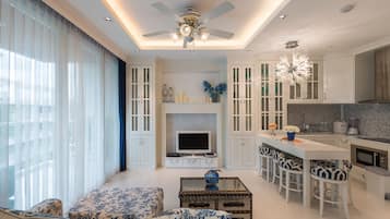 Suite, 2 Bedrooms | Living room | Flat-screen TV