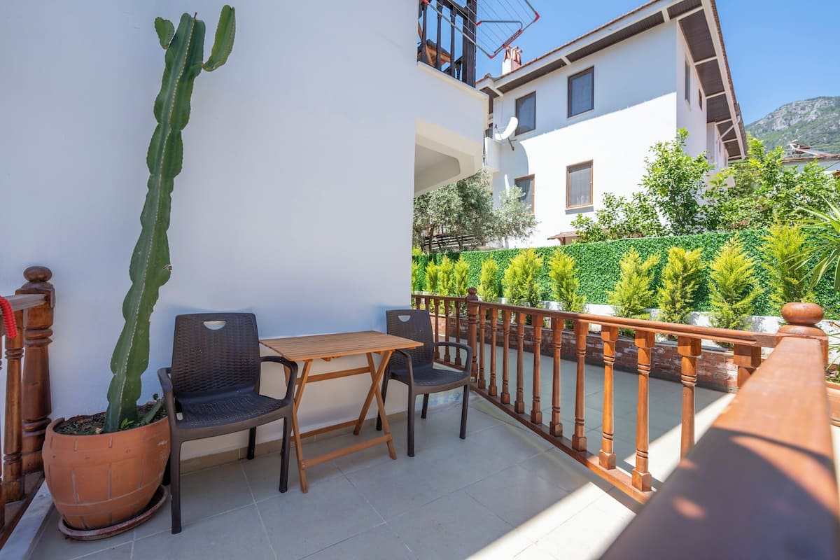 Economy Double Room, Garden Area | Desk, laptop workspace, blackout drapes, soundproofing