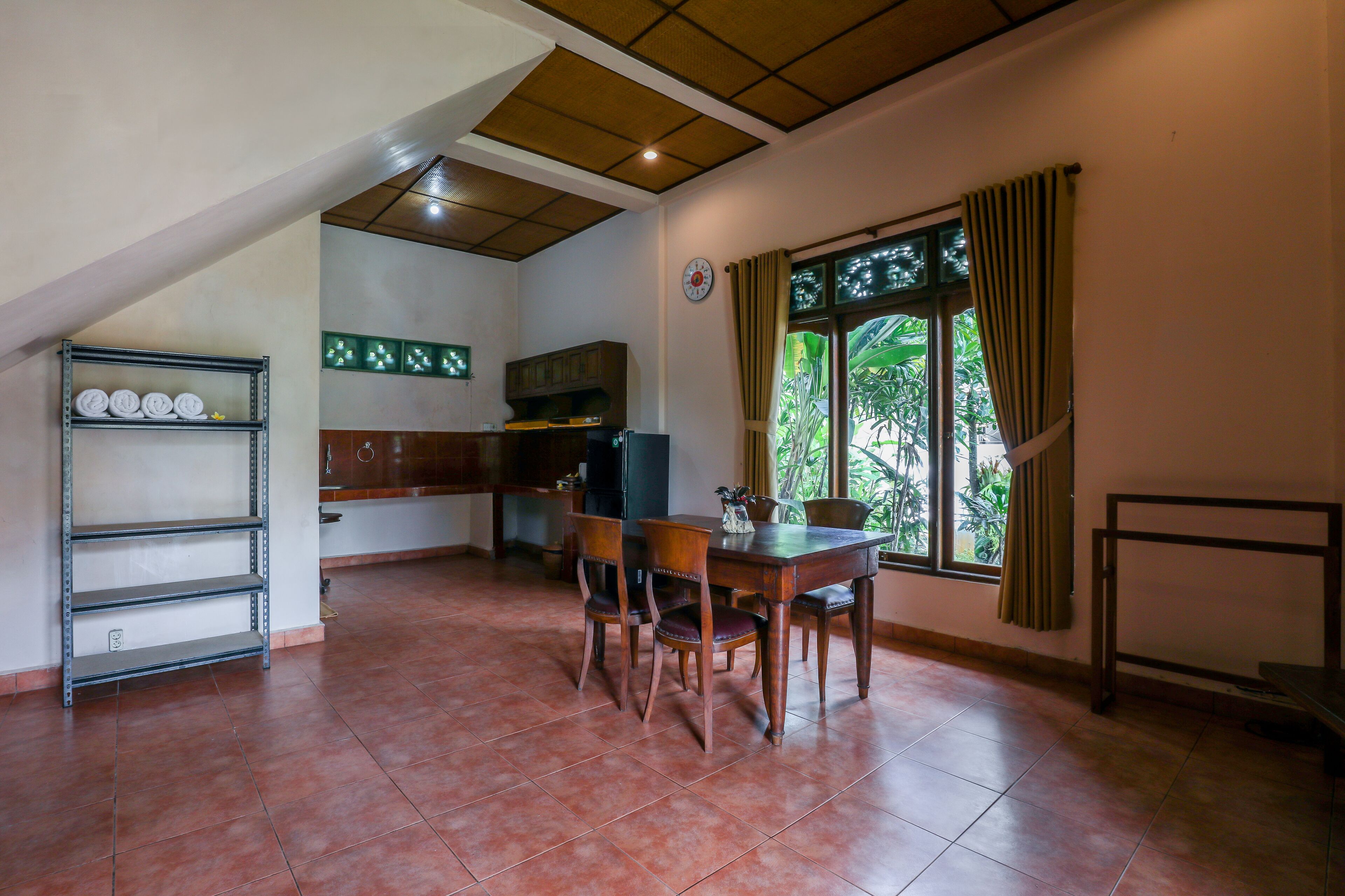 family room, 2 double beds, balcony, garden view | in-room dining