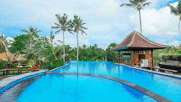 Outdoor pool, open 6:00 AM to 9:00 PM, sun loungers