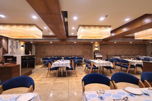 Breakfast, lunch, dinner served; Indian cuisine, garden views 